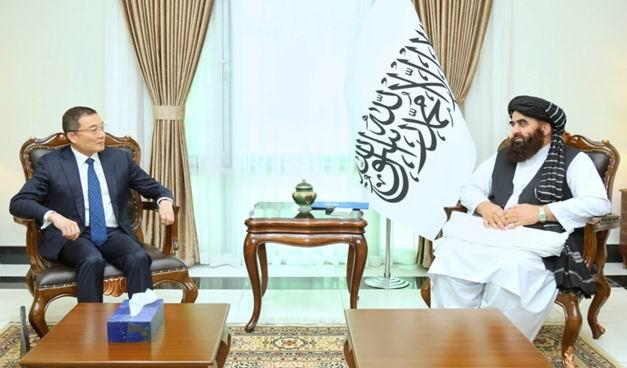 Japanese envoy meets Afghan acting foreign minister, as Taliban faces criticism over restrictions on female aid workers